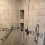 Shower grab bar