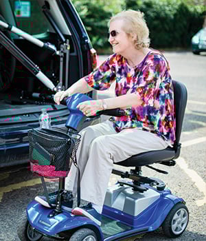 Woman on electric scooter
