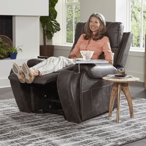 Person sitting in lift chair